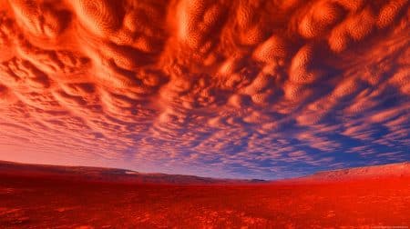 Illustration de la formation d'un nuage de 1 800 kilomètres près du volcan Arsia Mons sur Mars.